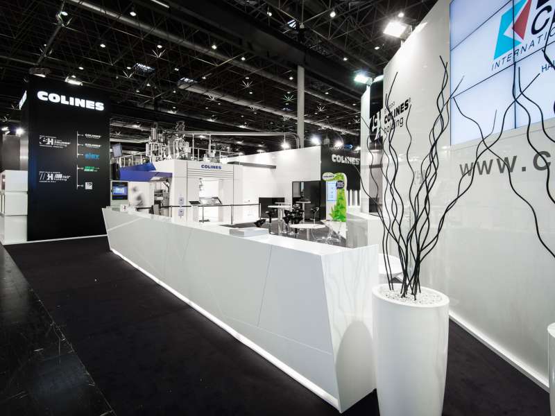 fairs abroad, stand with mezzanine, videowall and interactive totem, lacquered stands, customized stands and display cases