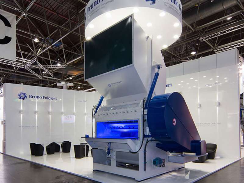 exhibitors' furniture and customized tables, highly customized solutions, videowall and interactive totem, lighting engineering, concept and design