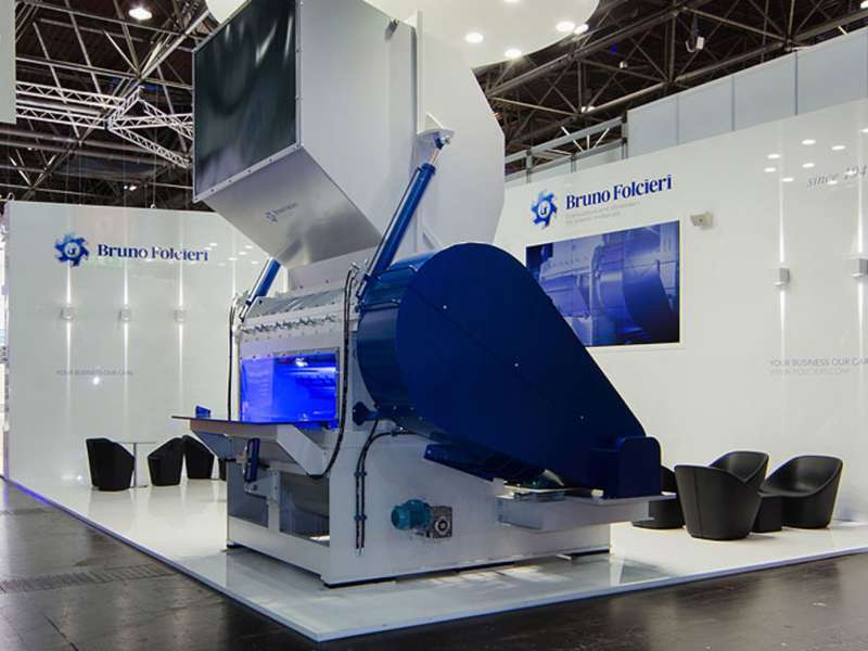 exhibitors' furniture and customized tables, highly customized solutions, videowall and interactive totem, lighting engineering, concept and design