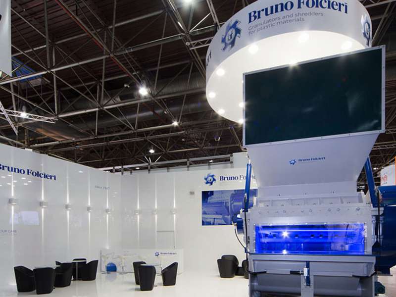 exhibitors' furniture and customized tables, highly customized solutions, videowall and interactive totem, lighting engineering, concept and design