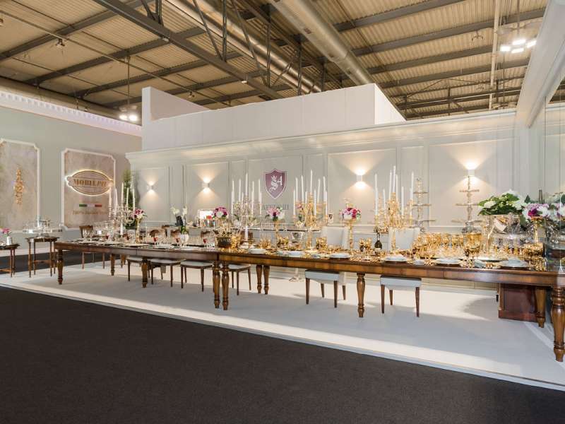 exhibitors' furniture and customized tables, lighting engineering, assembly teams, contemporary design and architecture, installations for special events