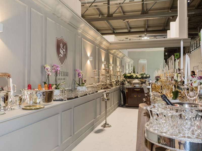 exhibitors' furniture and customized tables, lighting engineering, assembly teams, contemporary design and architecture, installations for special events