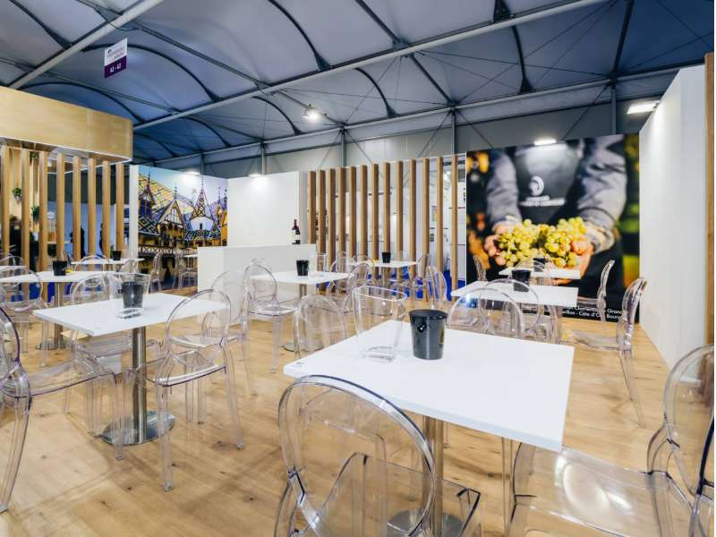 exhibitors' furniture and customized tables, stand with mezzanine, made in Italy, two-levels booth, form group