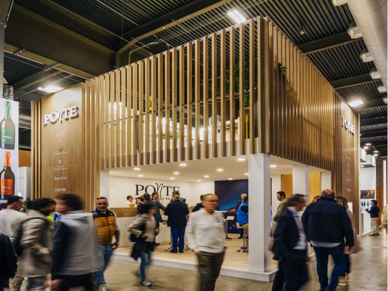 exhibitors' furniture and customized tables, stand with mezzanine, made in Italy, two-levels booth, form group